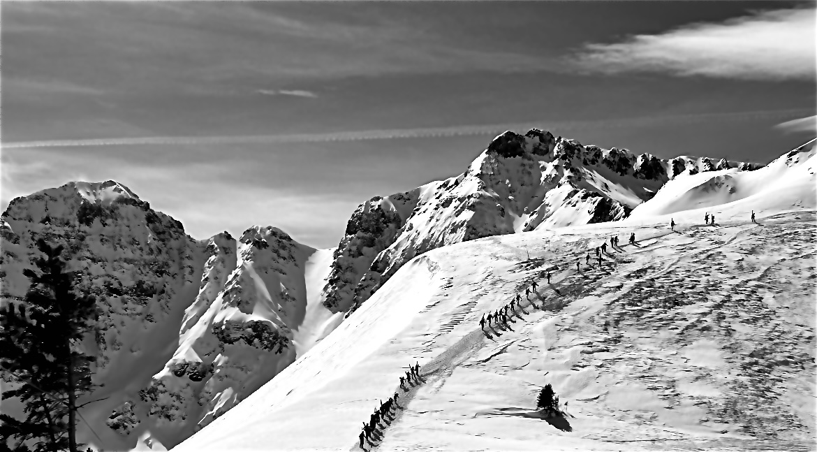 Athletes hiking the ridgeline at Loveland Ski Area