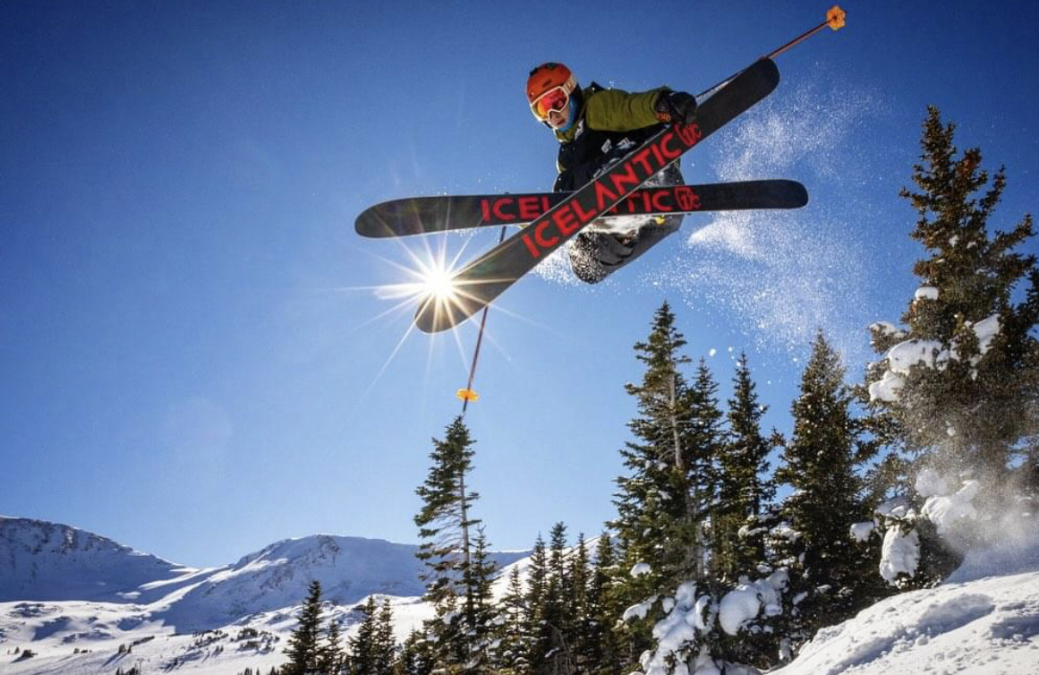 Skier catching big air with Icelantic skis at Loveland