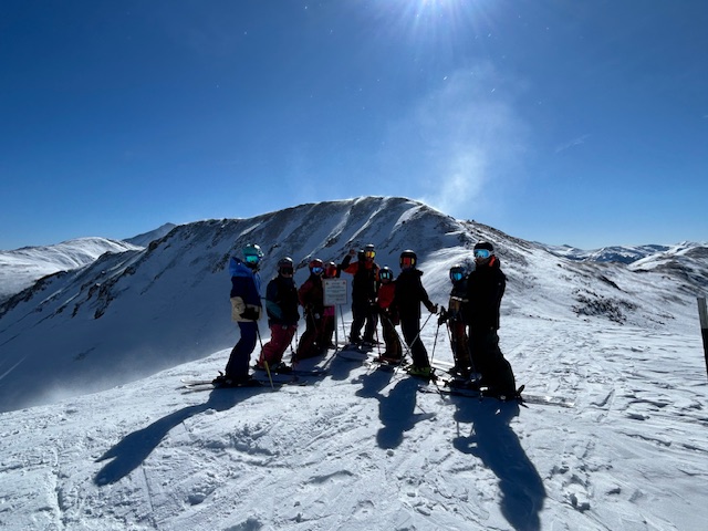The crew at the top of Loveland