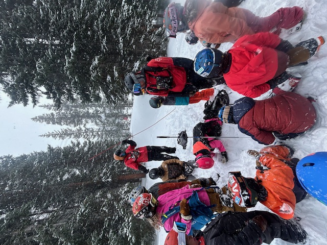 Team gathering in the snow